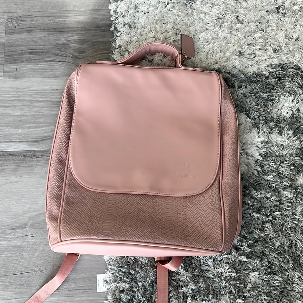 Never used. Tote & Carry Packpack. 💓